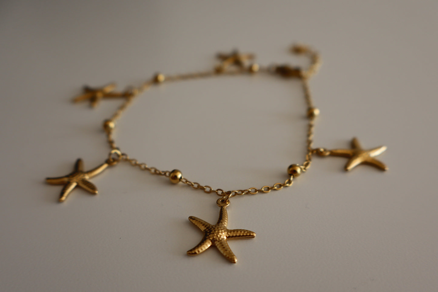 Tobillera estrellas de Mar en Dorado